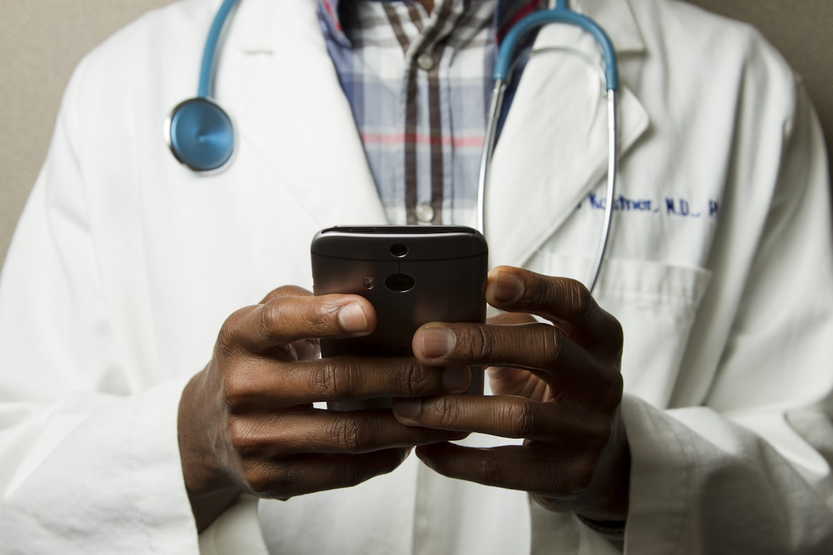Medical professional using an AI-assisted clinical interface